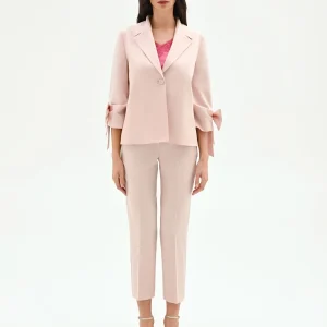 Giacca blazer rosa con fiocco sulla manica