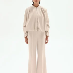 Bomber in similpelle tortora beige con maniche a palloncino