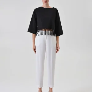 Maglia nera con passamaneria e frange