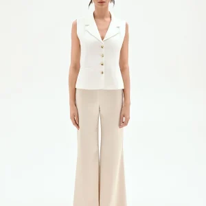 Gilet panna con bottoni design oro