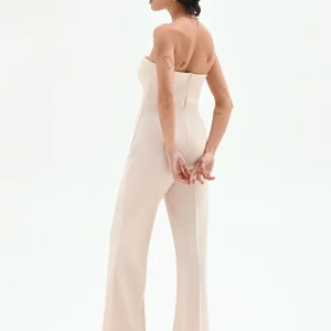 Tuta palazzo beige chiaro con bottoni e bustier