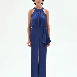 Tuta elegante blu brillante con drappeggio laterale