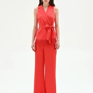 Gilet in raso rosso fragola con frange