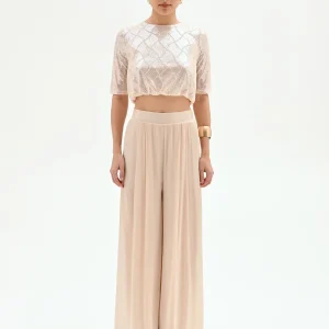 Pantalone a palazzo beige chiaro in raso cangiante