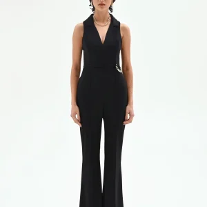 Tuta lunga nera con catena e scollo a rever