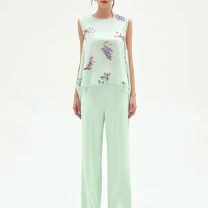 Top asimmetrico verde menta a stampa floreale