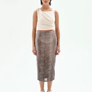 Top asimmetrico panna con accessorio oro