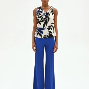 Top asimmetrico blu cina con stampa astratta