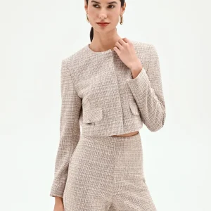 Giacca beige chiaro in tweed con tasche applicate