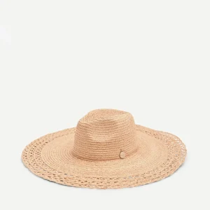 Cappello beige a tesa larga con lavorazione traforata