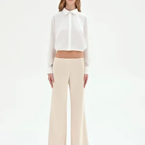Camicia cropped panna con fondo elastico