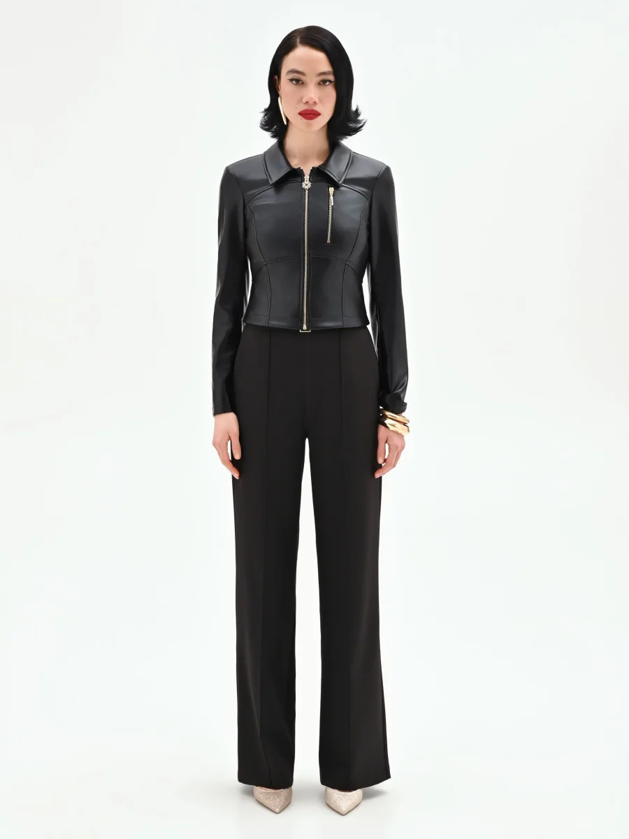 Biker nero effetto pelle con dettagli dorati