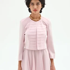 Coprispalla rosa pastello con pieghe orizzontali