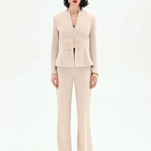 Giacca beige chiaro con drappeggio in vita