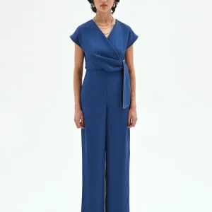 Tuta blu brillante con cintura annodata