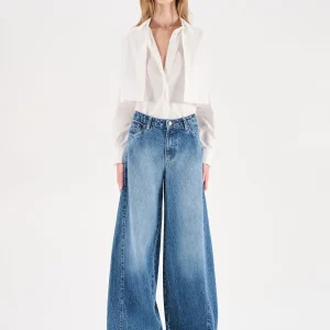 Jeans azzurri a gamba larga con risvolto