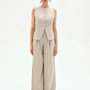 Gilet beige gessato con punti luce